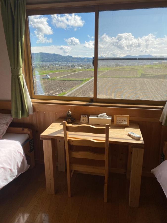 Отель Azumino Backpackers 山の風 Matsukawa Экстерьер фото